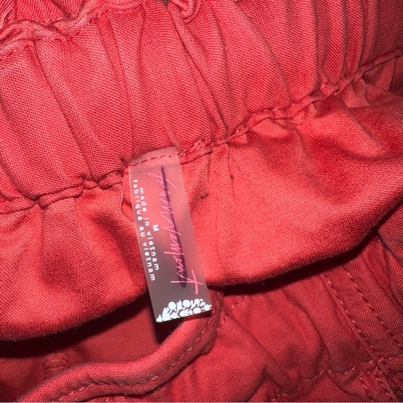 Free People Movement Back To The Future Orange Crush Elastic Tie Zip Pant size M - Picture 2 of 5